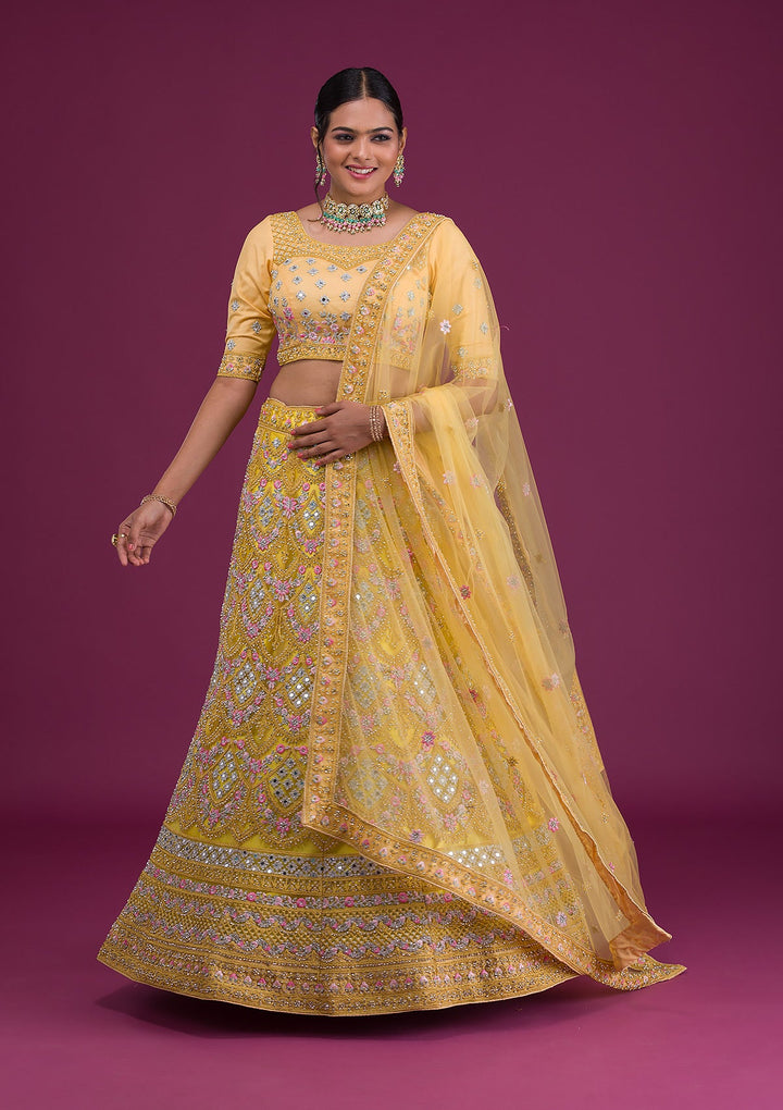 Yellow Threadwork Net Semi-Stitched Lehenga-Koskii