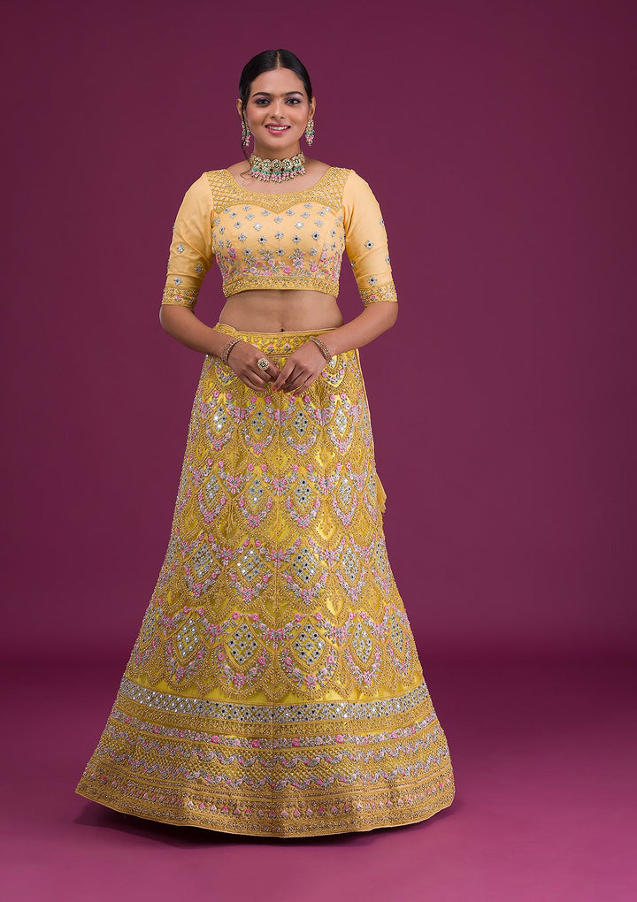 Yellow Threadwork Net Semi-Stitched Lehenga-Koskii